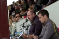Harness Racing Victoria caller Dan Mieleckie (centre) calling the action at Central Park.